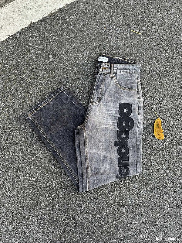 Balenciaga Logo Jeans with large side script branding and a faded leg in Gray Wash