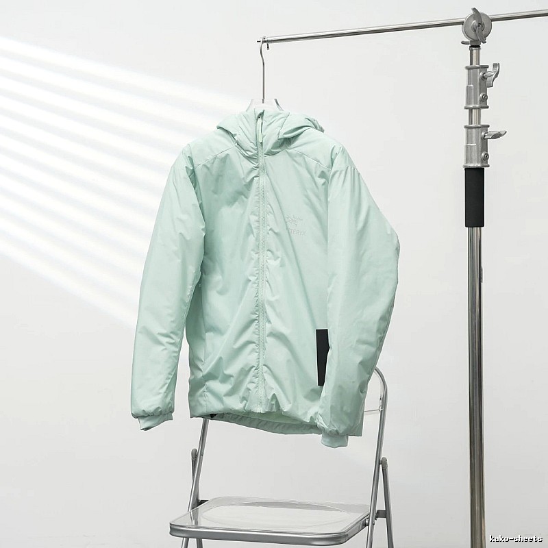 Clean Hooded Profile And Minimal Chest Branding Arc'teryx Lightweight Shell Jacket in Mint Green