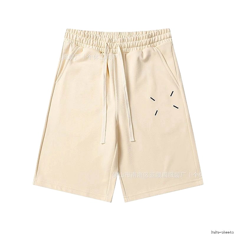 Maison Margiela minimalist style beige shorts