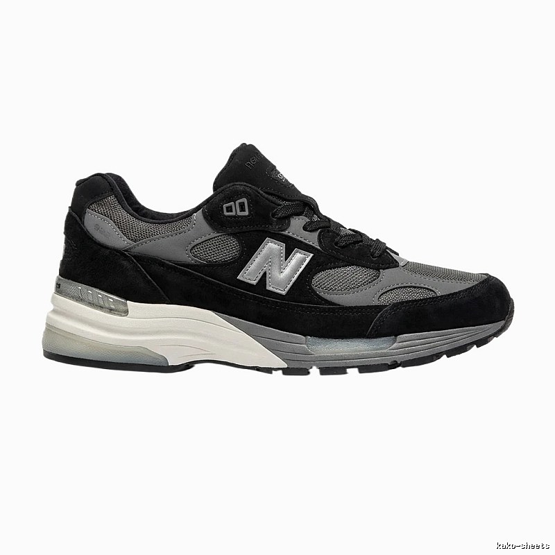 New Balance retro-style black and grey sports shoes